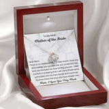 The perfect gift for mom on your wedding day. Brilliant 14k white gold, Zirconia crystal with smaller cubic zirconia. Includes a heartfelt message card from daughter to mother.