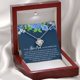 The perfect gift for your future mother in law. Brilliant 14k white gold Love Knot necklace, Zirconia crystal with smaller cubic zirconia. Includes a heartfelt message card included guaranteed to melt your new mother in laws heart.