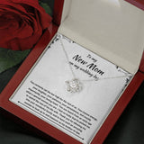 The perfect gift for your future mother in law. Brilliant 14k white gold Love Knot necklace, Zirconia crystal with smaller cubic zirconia. Includes a heartfelt message card included guaranteed to melt your new mother in laws heart.